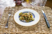 Dine & Enjoy a Cooking Demo at Local's Home in Pisa