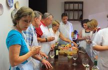 Cooking class, visit to the wine cellar, 2500 year old granaries