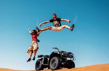 Dubai: Quad Bike Tour with Camel Ride, Sand Boarding & BBQ