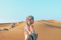 Morning Red Dunes Safari: Camel Ride & Sandboarding Adventure