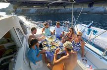 Santorini Full Day Catamaran Private Cruise incl. Meal, Drinks & Free Transport