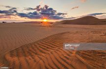 Thrilling Morning Red Dune Desert Safari with Camel Ride in Dubai