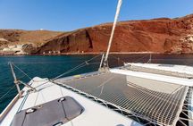 Santorini Half Day Catamaran Private Cruise incl. Meal, Drinks & Free Transport