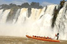 Motorboat under the waterfalls, 4x4 truck in the jungle with Argentine Falls