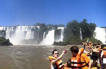 Motorboat under the waterfalls, 4x4 truck in the jungle with Argentine Falls
