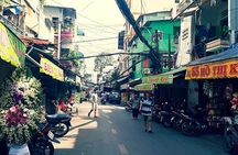 Morning Saigon Unseen+Street Food Tour with Ao Dai Riders Option