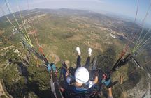 paragliding at the mountains with hotel pickup 