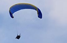 paragliding at the mountains with hotel pickup 