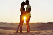 Camel Rock Desert safari Dubai with bbq Dinner camel ride sand boarding & more