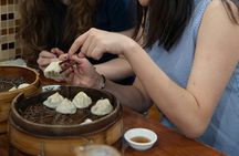 Private Tour: Shanghai Acrobatic Show and Authentic Dim Sum