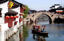 Private Qibao Ancient Town Walking Tour with Tea Tasting and Calligraphy Experience