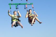 Fly Above Cancun Bay: Parasailing Experience