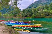 Tamul waterfall and water cave on a wooden canoe