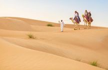 Dubai Red Dunes Safari by Quad Bike, Sand boarding, Camel Ride & BBQ Dinner
