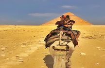 Private Experienced Tour for Camel ride during the sunset with Local Bedouin Dinner