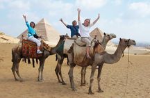 Day tour Giza pyramids, Egyptian Museum with 2:Hrs camel ride during the sunset 