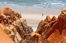 The colorful sands of Morro Branco beach - Full Day Tour