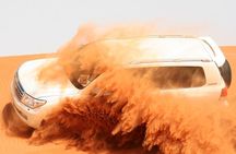 Golden Dunes & Sunset Safari with BBQ, Camel Ride & Sandboarding