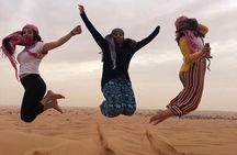 Dubai Morning Safari – Dune Bashing, Camel Ride & Sandboarding