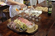 Cooking class, visit to the wine cellar, 2500 year old granaries