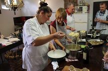 Cooking class, visit to the wine cellar, 2500 year old granaries
