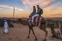 Dubai Evening Desert Safari, Camel Ride, Sandboarding & BBQ Dinner 