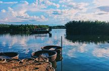 Countryside bike tour, basket boat and cooking class 