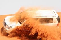 Morning Dubai Desert Safari with Sand boarding and Camel Ride