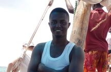 Zanzibar Dhow Cruise day adventure, sea sports at Kwale Island, very memorable