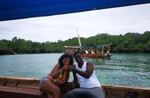 Zanzibar Dhow Cruise day adventure, sea sports at Kwale Island, very memorable