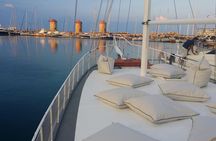 Sunset Cruise with a Swimming Stop at Kalithea Bay
