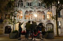 Barcelona Night Bike Tour with Local Tapas and Cava Stop