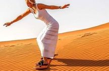 Desert Safari : free Sandboarding, Camel Riding,BBQ Dinner + Live activities 