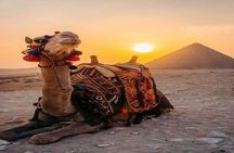 Private Camel Riding Tour of Giza Pyramids at Sunset with Local Bedouin Dinner