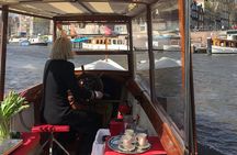 Private canal cruise on small historic boat