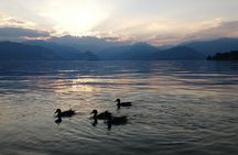 Slow boat tour for small groups with appetizer on Lake Maggiore