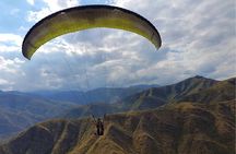 Paragliding free flight experience over the pre-range
