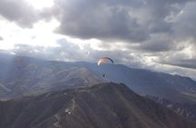 Paragliding free flight experience over the pre-range