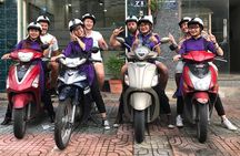 Private Ho Chi Minh Street Food Tour by Motorbike with Ao Dai Female Rider