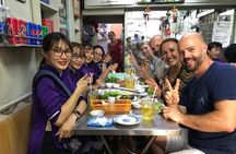 Private Ho Chi Minh Street Food Tour by Motorbike with Ao Dai Female Rider