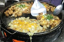 Private Ho Chi Minh Street Food Tour by Motorbike with Ao Dai Female Rider