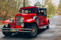Karlstejn Castle in Vintage Convertible Car