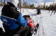 Snowmobiling and Ice Fishing in Apukka Resort, Rovaniemi