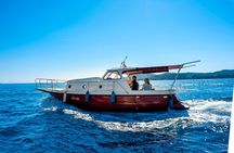Private boat tour- explore the islands, find hidden caves and try snorkelling 