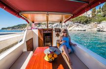 Private boat tour- explore the islands, find hidden caves and try snorkelling 