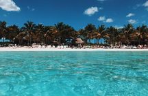 Live this unique experience. Catamaran to Isla Mujeres Tour. Open Bar included.