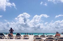 Live this unique experience. Catamaran to Isla Mujeres Tour. Open Bar included.