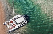Snorkel adventure to Isla Mujeres by Catamaran. Open Bar and buffet included.