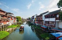 Private Qibao Ancient Town Walking Tour with Tea Tasting and Calligraphy Experience