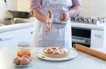 Dining Experience at a local's Home in Catttolica with Show Cooking